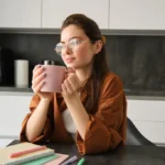 rsz portrait young selfemployed woman working from home taking break coffee sitting with