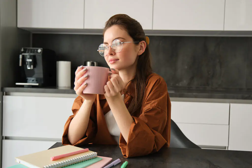 rsz portrait young selfemployed woman working from home taking break coffee sitting with